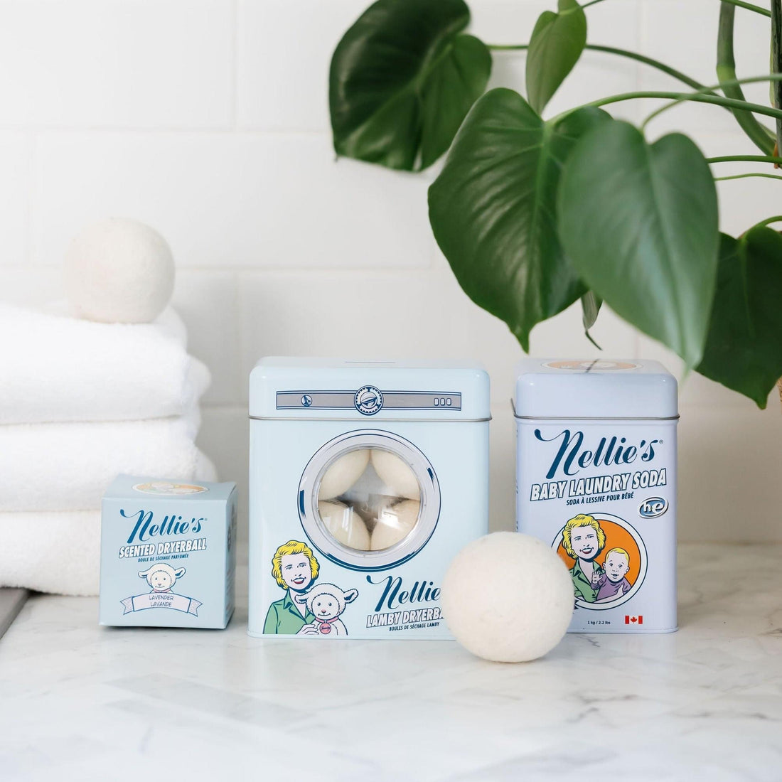 Baby Laundry detergent, Wool Dryerballs and Lavender Scented Wool Dryerball on a counter