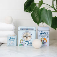 Baby Laundry detergent, Wool Dryerballs and Lavender Scented Wool Dryerball on a counter