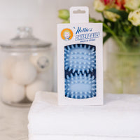 Two blue dryerballs with rubber spikes