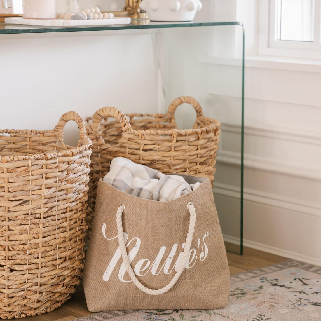 Brown jute tote bag with rope handles with blanket inside